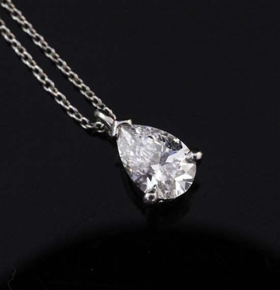 A Tiffany & Co platinum and pear shaped solitaire diamond pendant, pendant 0.25in.